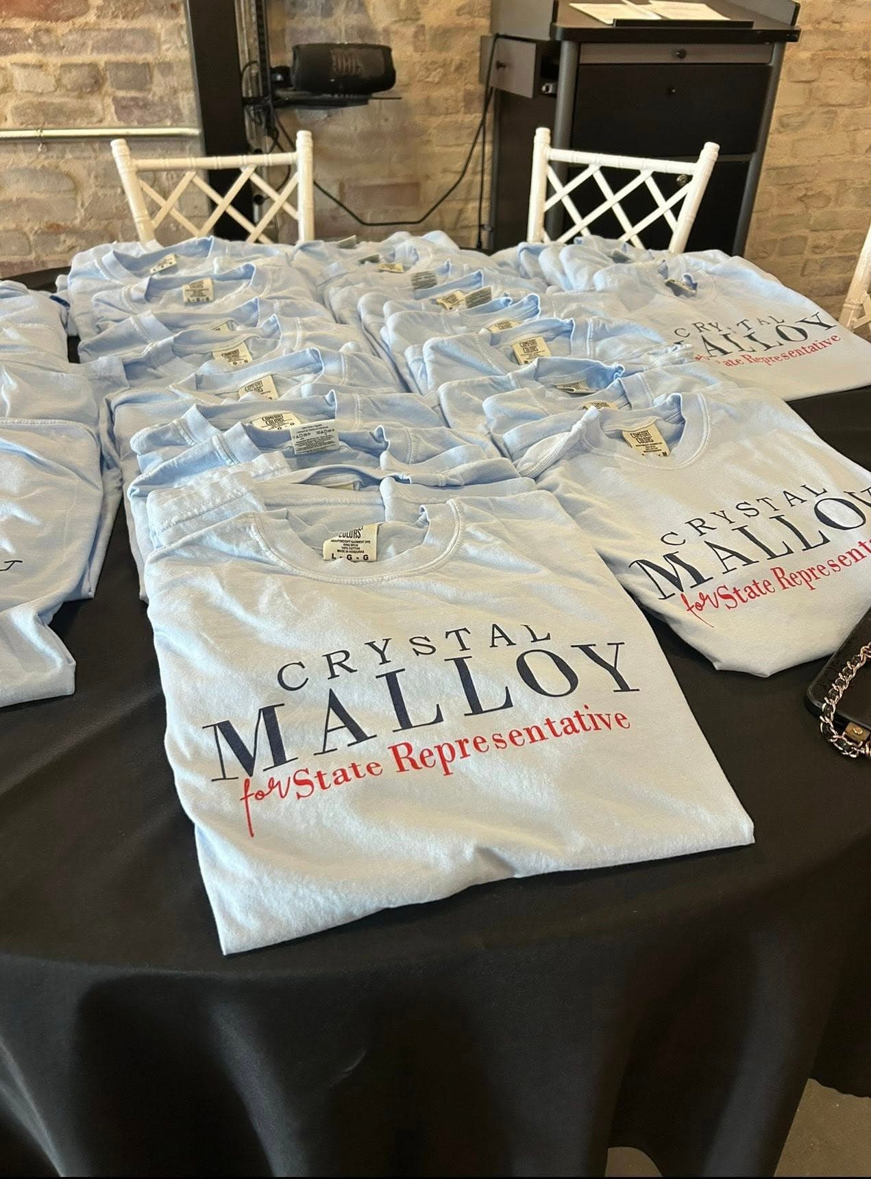 Crystal Malloy campaign merchandise
